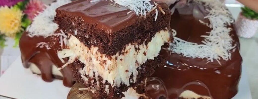 Um Bolo Gelado De Prestígio Irresistível, Com Recheio Cremoso De Coco E Cobertura De Chocolate....