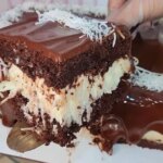 Um Bolo Gelado De Prestígio Irresistível, Com Recheio Cremoso De Coco E Cobertura De Chocolate....