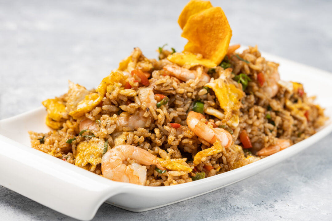 Arroz de forno com camarão cremoso, gratinado e com sabor de comida especial